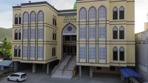 Aerial view of the Mosque in the city center at sunset