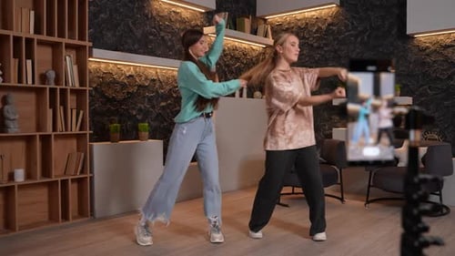 Smiling Women Dancing and Recording a Video