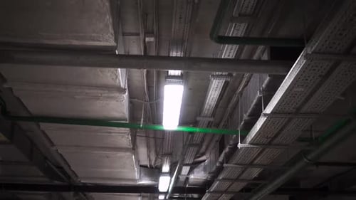 Industrial Ceiling with Pipes, Ducts, and Lighting
