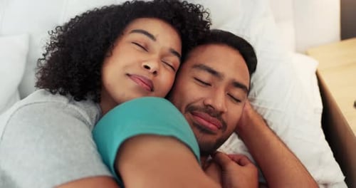 Close-Up of Loving Couple Relaxing in Bed