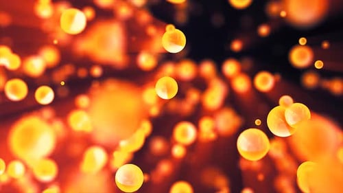 Abstract yellow orange glowing background with flying balls circles atoms