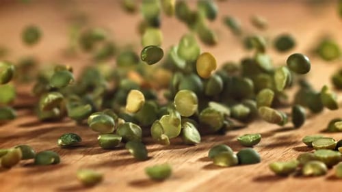 Green Peas Fall on the Table Filmed on a Highspeed Camera at 1000 Fps