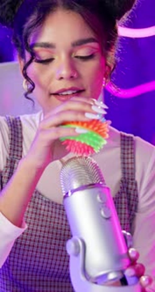 Woman, Live streaming and microphone for social media broadcast ball Asmr
