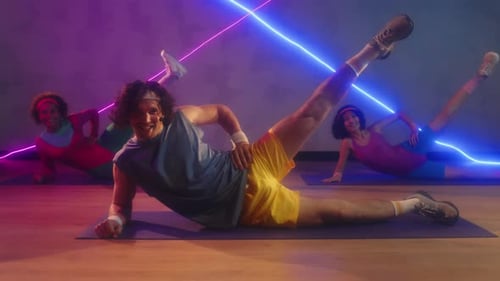 People Doing Leg Lifts During 80's Workout