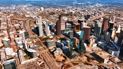 System of multilane highways going around the downtown with mighty skyscrapers. Panorama of Dallas