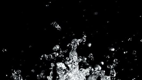 Water Droplets Rise and Fall on a Black Background Filmed on a Highspeed Camera at 1000 Fps
