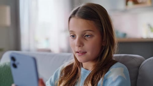 Enthusiastic Girl Chatting on Phone Video Call