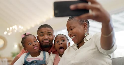 Happy Family Taking Selfie at Home