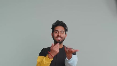 Indian Man Showing Thumbs Up Pointing Empty Place Advertising Area for Commercial Text Copy Space