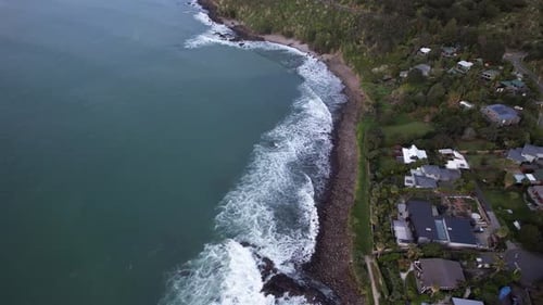 Waves On The Rocky Shore Of Whale Bay Beachfront Paradise Holiday House In Raglan, New Zealand. Aeri