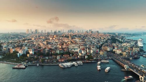 Golden Horn bridge and Istanbul cityscape at sunset
