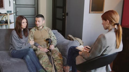 A Soldier Argues with His Wife in a Therapist's Office and Receives Counseling Support on Mental