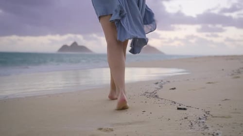 Close Up Woman Feet Walking Barefoot By Beach Leaving Footprints in White Sand