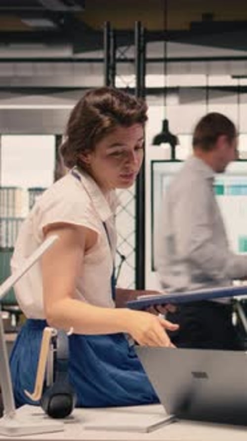 Vertical Video Diverse Employees Reviewing Data Analysis and Reporting in Office