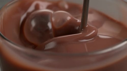 Pouring Chocolate Protien Shake In