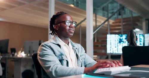 Black man, engineer and coding on keyboard in office and productivity on futuristic technology