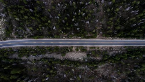 Right Trucking Aerial top bird's eye drone shot of a small canyon highway in the Uinta Wasatch Cache