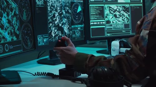 Military Soldier Operating Advanced Technology in a Command Center