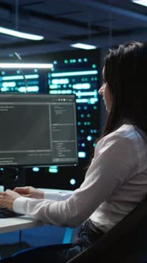 Vertical Video Team of Programmers in Data Center Responsible for Repairs