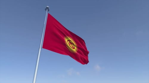 Kyrgyzstan National Flag Waving in Blue Sky