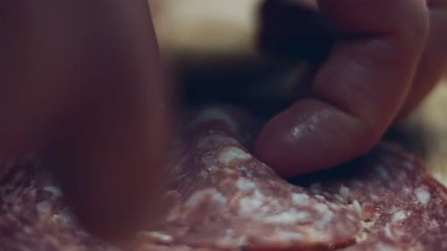 Smoke Transformation Effect of Heart Shapes of Fresh Italian Sliced Salami Sausage on a Wooden Tray