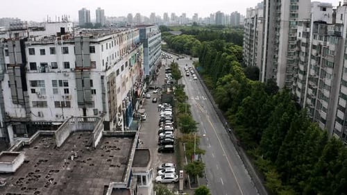 Downtown Shanghai city roads through residential district, aerial view