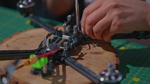 Close Up Details Woman Repairs Quadcopter