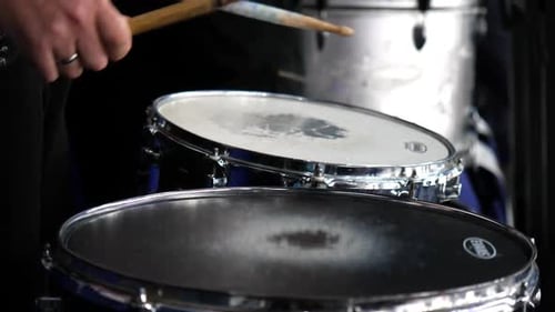 Close Up of Drummer Playing Snare Drums