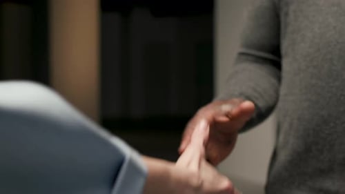 Professional Handshake Between Business Woman and Man