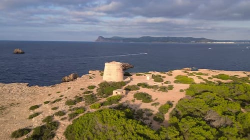mediterranean coastal sunset ancient historic tower. Great aerial top view flight panorama overview