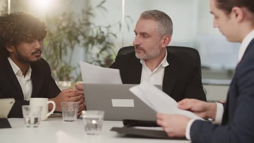 Business Professionals Team Meeting in a Modern Office