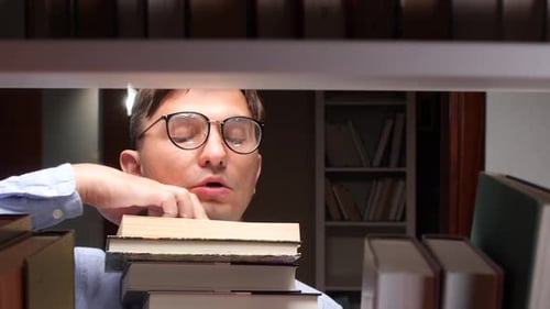 Librarian Searching Books on Library Shelf at Night