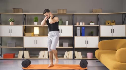 Adult Male Doing High Knees Workout at Home