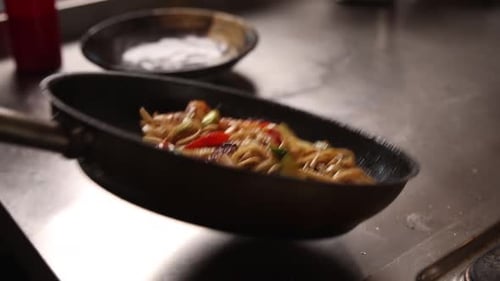 Noodles with seafood and vegetables in a Japanese restaurant