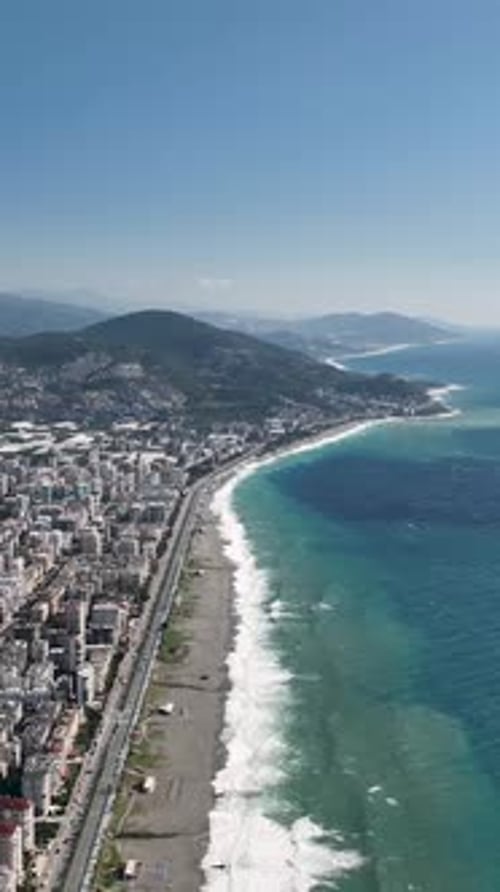 Vertical Video Cinematic Footage of Alanya's Pristine Waters and Azure Waves