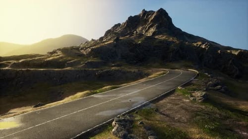 Scenic View of Empty Road Amidst Volcanic Landscape
