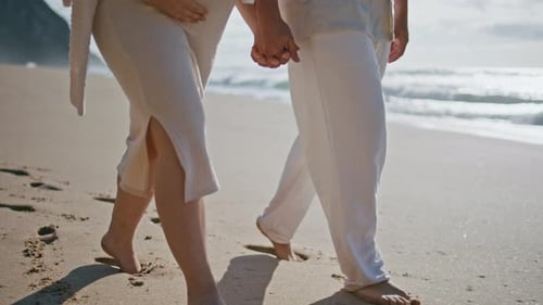 Pair Legs Walking Beach Near Ocean Waves Closeup Pregnant Couple Relaxing Sea