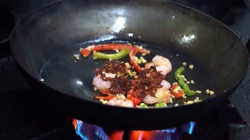 Cooking Shrimp in a Pan on a Stove