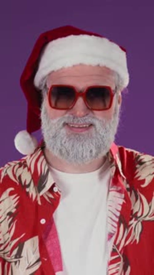 Vertical of Australian Santa Claus in Aloha Shirt Making Pinkie Hand Sign