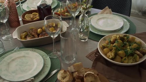 Elegant Dining Table with Food and Tableware