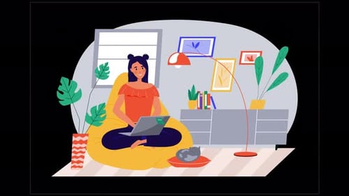 Personne travaillant sur un ordinateur portable dans un environnement familial confortable