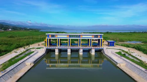 Aerial View of Water Control Structure in Scenic Landscape