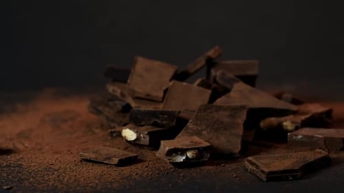Rotating Chocolate on a Dark Backdrop a Sensory Feast Symbolizes the Rich Depths of Flavor Ideal for