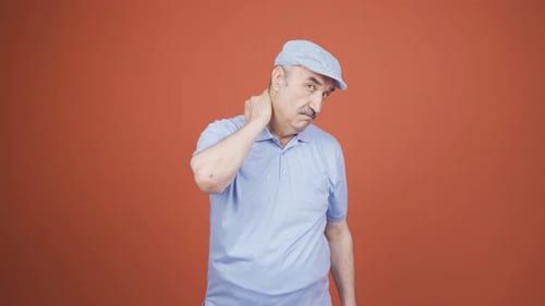 Senior Man Demonstrates See Hear Speak No Evil Gestures