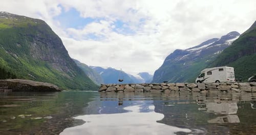 Family vacation travel RV, holiday trip in motorhome. Beautiful Nature Norway natural landscape.