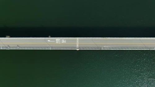 Small bridge on the green river.