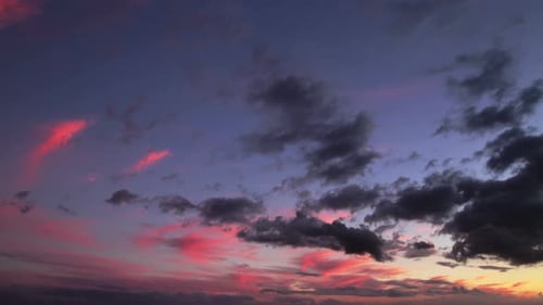 Pink Cloud Sunset Over the Horizon