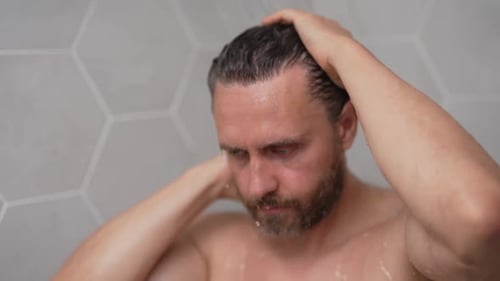 Man Takes Shower and Grooms Himself