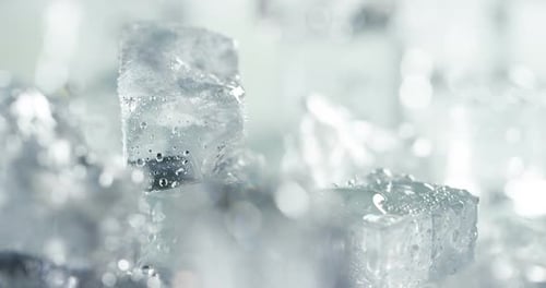 Melting ice cubes macro shot