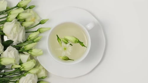 Floral Tea Cup Overhead with White Flowers